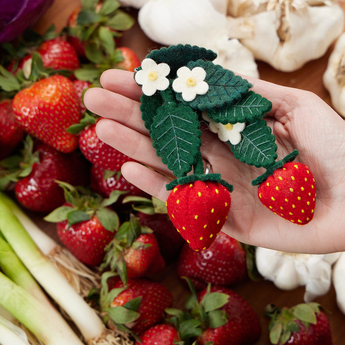Cluster of felt strawberries ornament with stitched leaves and red berries