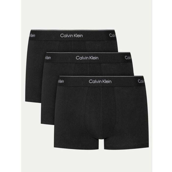 Image 2 : Vue rapprochée des trois boxers Calvin Klein Underwear noirs superposés, détail de l'élastique logotypé — Delvale