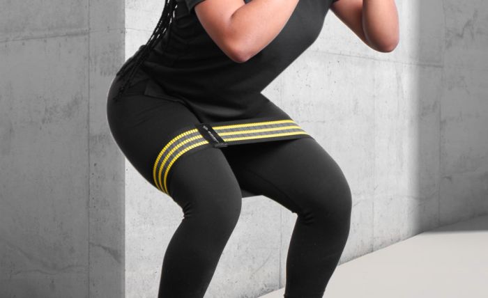 Element Fitness Hip Circle Band in use during squat