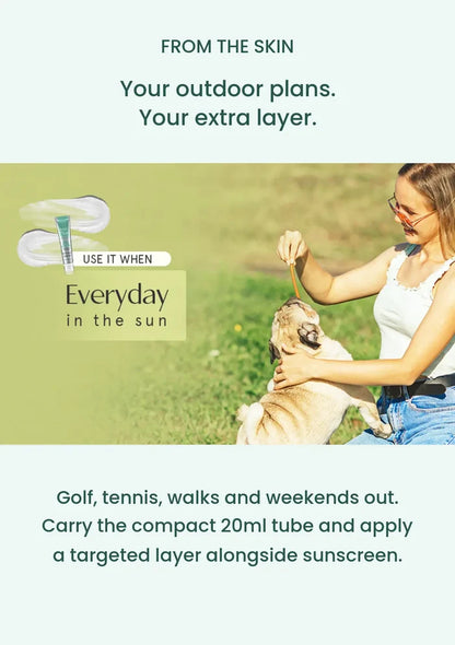 Everyday outdoor lifestyle image for FROM THE SKIN Sun Gel Patch, showing a woman walking her dog