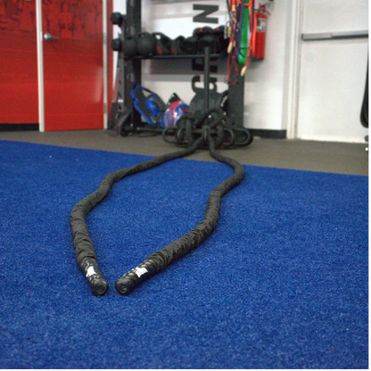 Gronk Fitness Battle Rope extended on gym floor