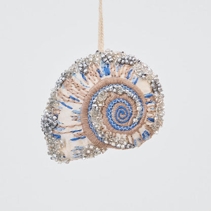 Craftspring’s Moon Snail Shell Ornament — made of satin with intricate beaded and embroidered details, heirloom-quality Christmas decor, ethically crafted by artisans.