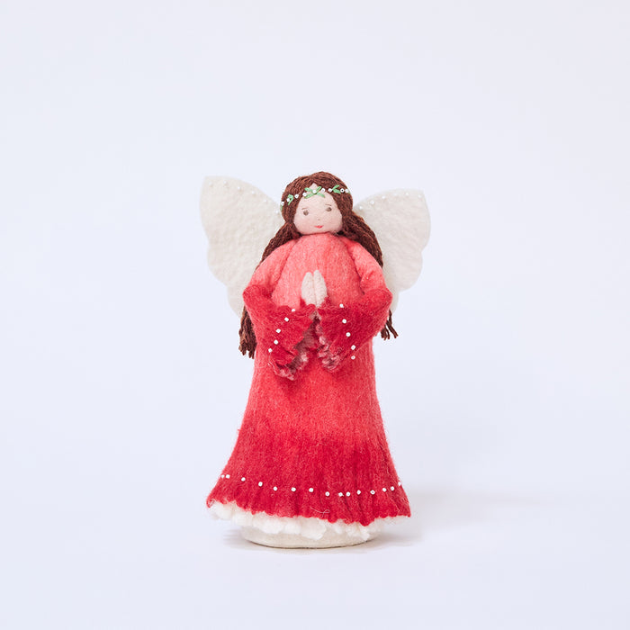 Craftspring’s Praying Angel Tree Topper - Light — felt angel wearing a red dress with white beads, an embroidered and beaded wreath crown, and hands in prayer, with a sweet face — heirloom-quality Christmas tree topper, perfect for holiday gifting, ethically crafted by artisans using sustainable wool.