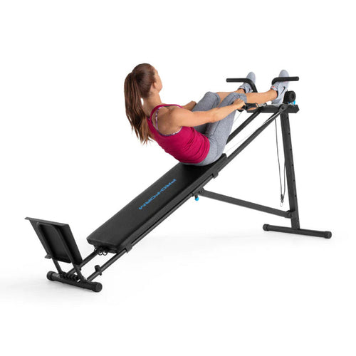 ProForm bench in use with woman exercising