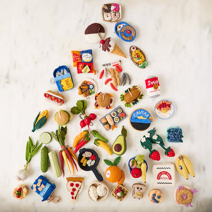 Artisan wool radish bunch ornament tied to garden gifts or cookbooks