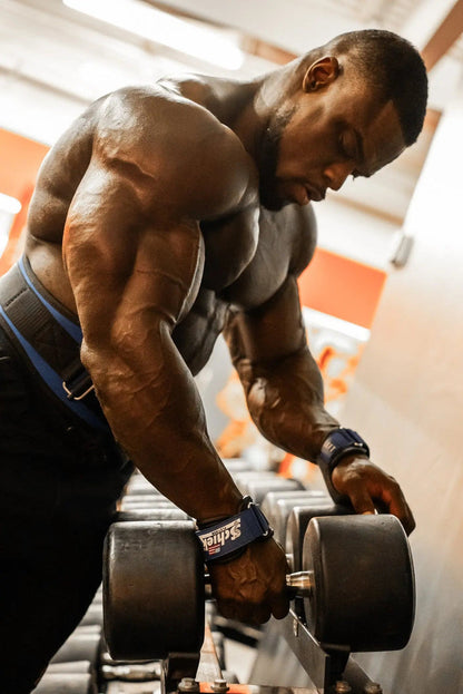 Schiek Platinum Ultimate Grips used during dumbbell lift