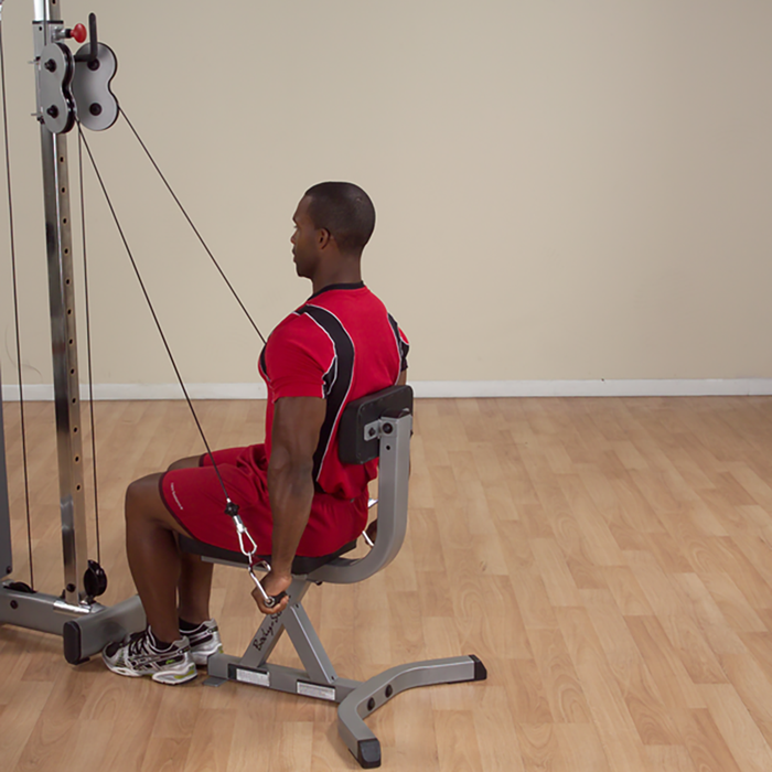 Body Solid Stirrup Handle used in seated triceps extension