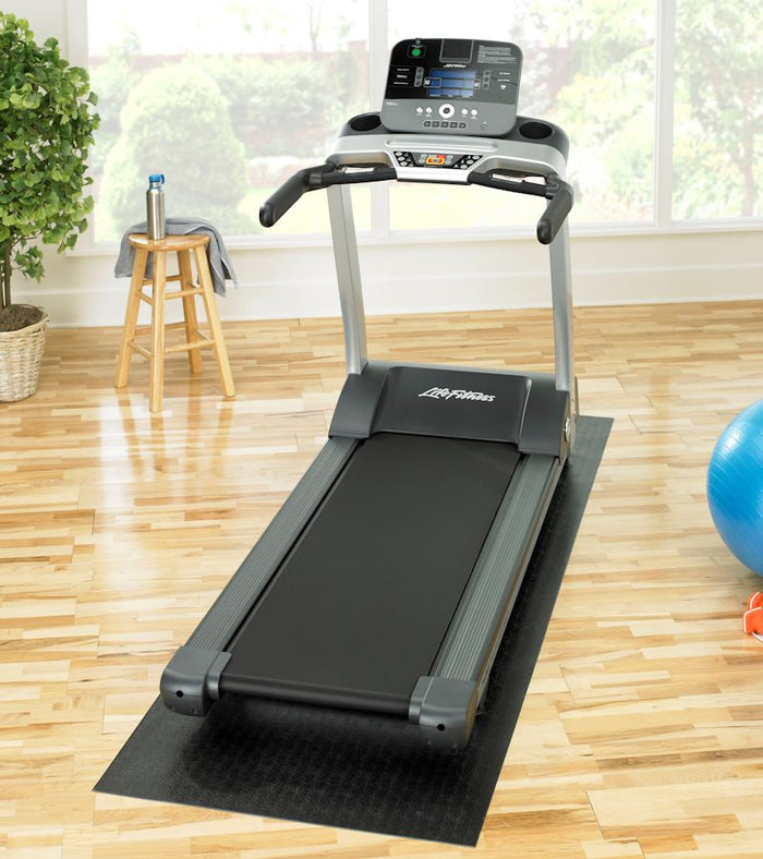 Gronk Fitness SUPERMAT under treadmill in home gym