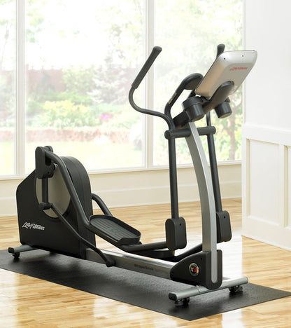 Gronk Fitness SUPERMAT under elliptical in bright room