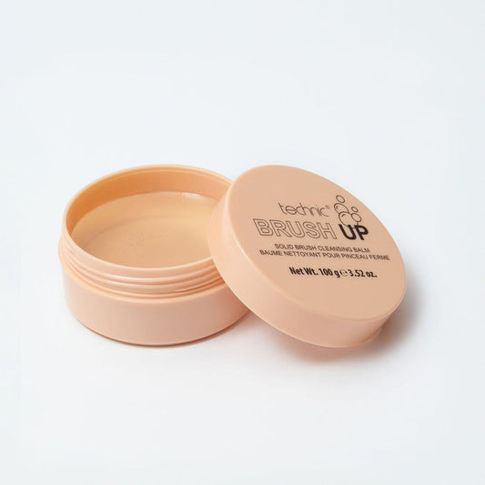 An opened brush up blush cleaner on a white background.
