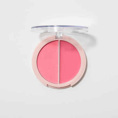 An opened coupled up blusher in the shade Island Romance on a white background.