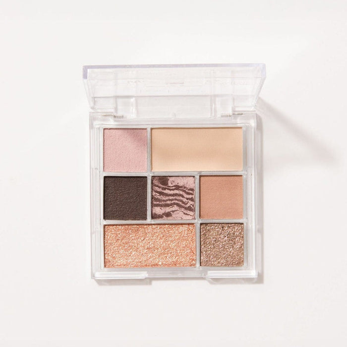 Close up of Technic Warm Tones eyeshadow palette with dusty rose and copper gold
