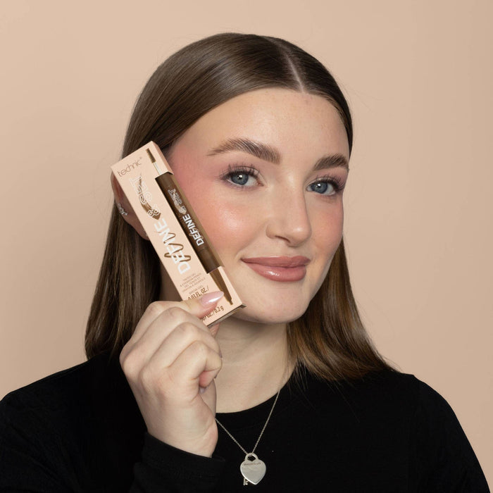 Technic Define & Set 2-in-1 Brow Sculpt packaging held by model