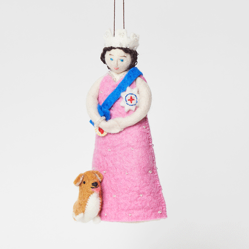 Young Queen Elizabeth II felt ornament in gala attire with a loyal corgi at her side. Handmade wool Christmas ornament honoring British royalty. Fair trade and ready to hang. GIF 360 degree view